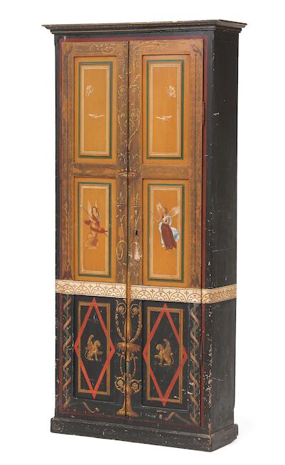 Danish artist furniture c. 1840: A cupboard of painted wood, decorated in colours in Pompeian style. H. 194 cm. W. 116 cm. D. 27 cm.