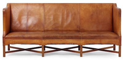 Kaare Klint: Three-seater sofa on profiled, eight-legged Cuban mahogany cross frame. Upholstered with patinated original Niger leather. Three-seater sofa on profiled, eight-legged Cuban mahogany cross frame. Sides, seat and back upholstered with patinated original Niger leather. Model 4118. Designed