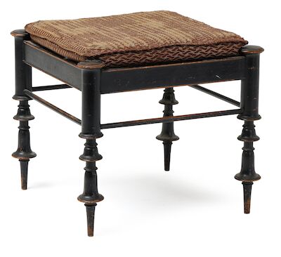 Kay Fisker: Black-lacquered wood stool with profiled rail. H. 41 cm. Black-lacquered wood stool with profiled rail. Mounted on turned, tapered legs with round, horizontal stretchers. Loose cushion upholstered with fabric. Designed 1925. Made 1925-1930s by cabinetmaker V. Bloch Jørgensen. H. 41 cm. W