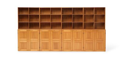 Mogens Koch: Solid elm wall unit. Comprising of four cabinets and four bookcases. (8) Solid elm wall unit. Comprising of four cabinets and four bookcases with original holes for wall-mounting. Interiour with shelves including one pull-out tray. Made and marked by Rud. Rasmussen Cabinetmakers, 1980s.