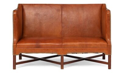 Kaare Klint: Freestanding two seater sofa mounted on a six-legged mahogany cross-frame. Upholstered with patinated Niger leather. Freestanding two seater sofa mounted on a six-legged mahogany cross-frame. Sides, seat and back upholstered with patinated Niger leather. Model 4118. Designed 1930. Made