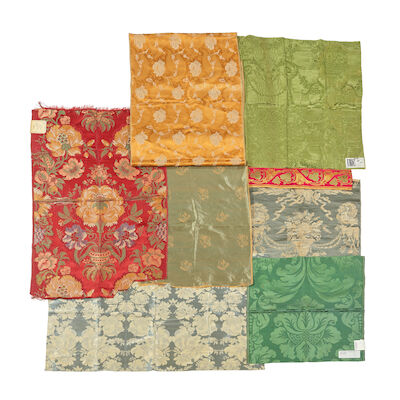 A selection of silk fragments and panels, to include a panel of French 19th century green silk moiré damask ((qty))